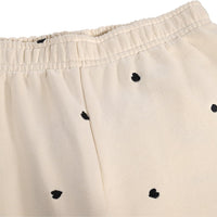 Ensemble de jogging beige imprimé petit coeur noir fille E26