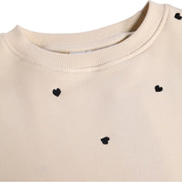 Ensemble de jogging beige imprimé petit coeur noir fille E26