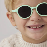 Lunettes de soleil rose Sun Kids Plus Izipizi #Aqua Green