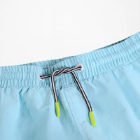 Short maillot Niko Solid bleu garçon Molo E26