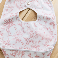 Bavoir toile de jouy rose enduite Tartine et Chocolat